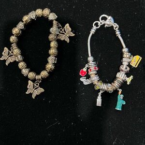 Lot of 2 Charm Bracelets One Gold Tone and One Silver Tone - Never Worn